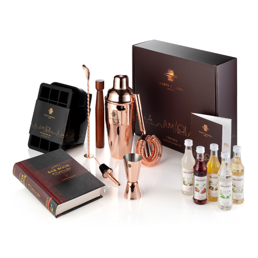 Chelsea rose gold Manhattan cocktail making bundle with gift box, bar tools, Ultimate Bar Book, ice trays and five Monin syrups.